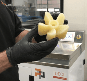 PolyJet propeller in hands of technician.