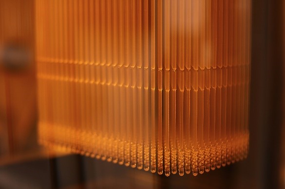 Orange 3D printed Resin swabs on 3D printer