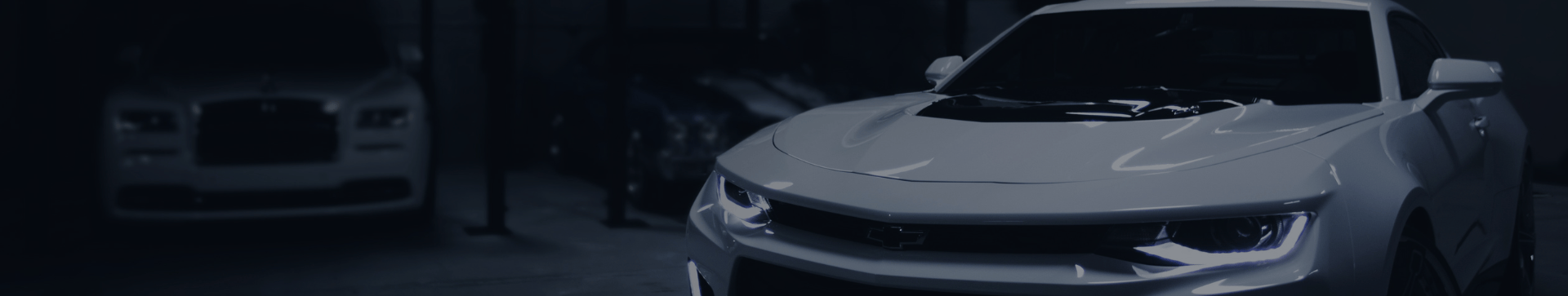 black tinted image of a white car